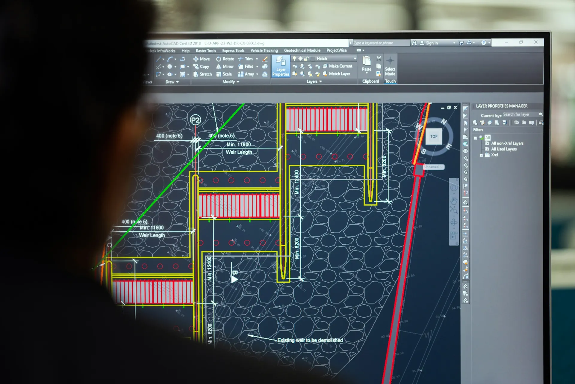 A construction drawing open on a workstation monitor
